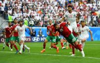 Iran beat Morocco with 95th-minute own goal
