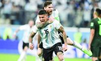 Messi, Rojo rescue Argentina from humiliating early exit
