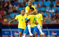 Brazil ease into last 16