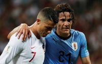 Brilliant Cavani brace fires Uruguay into last 8